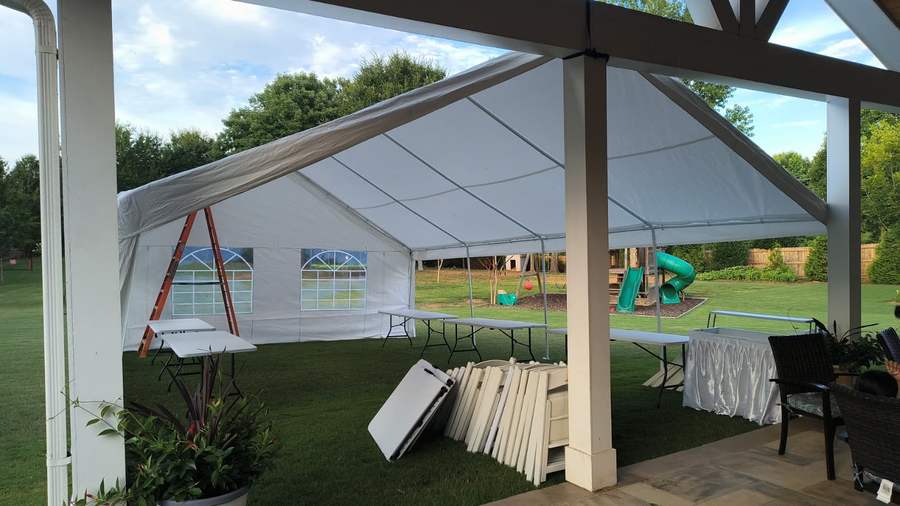 Tent beside a covered patio